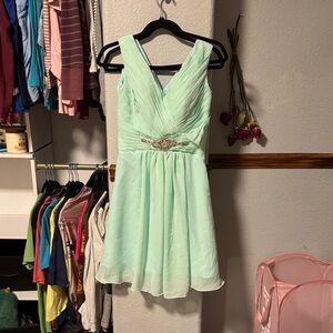 Elegant Mint Green Dress with Embellished Waist